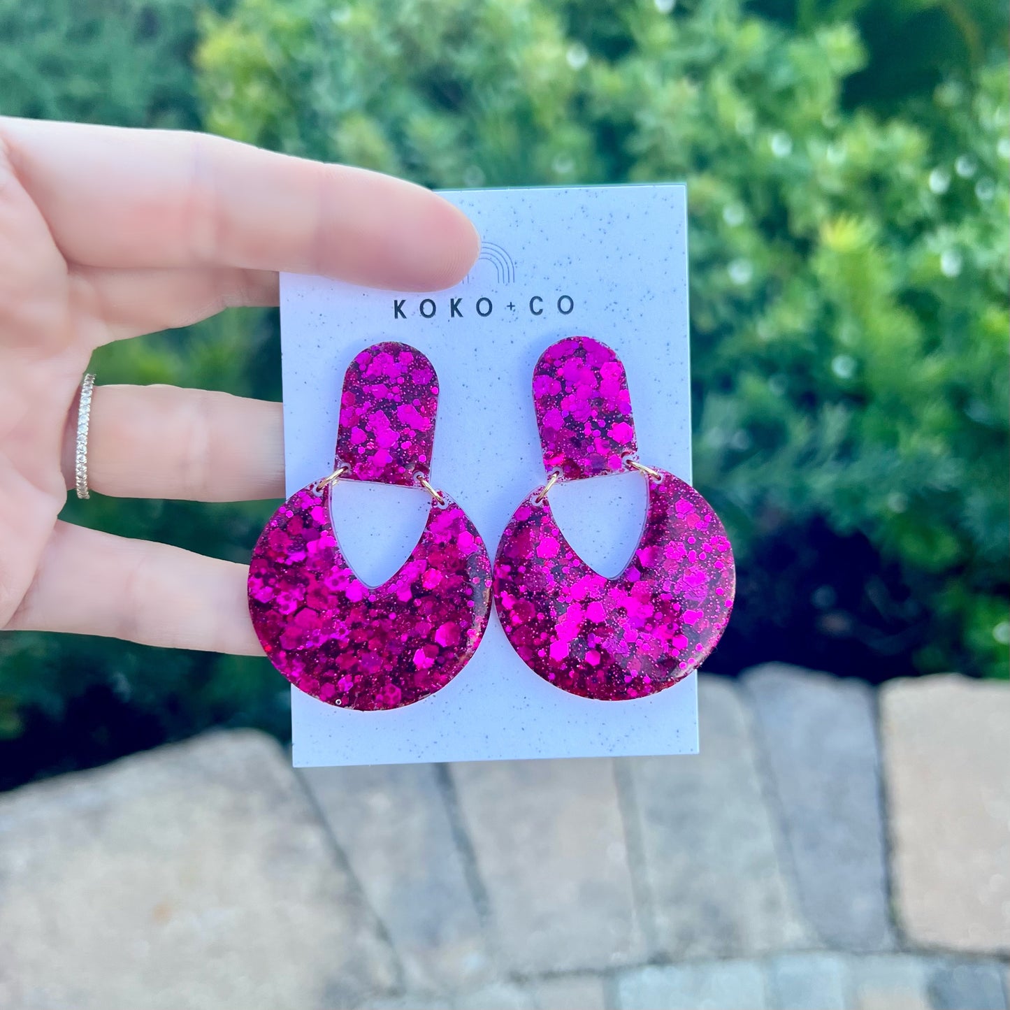 Spin You Around Sparkle Earrings in Fuchsia
